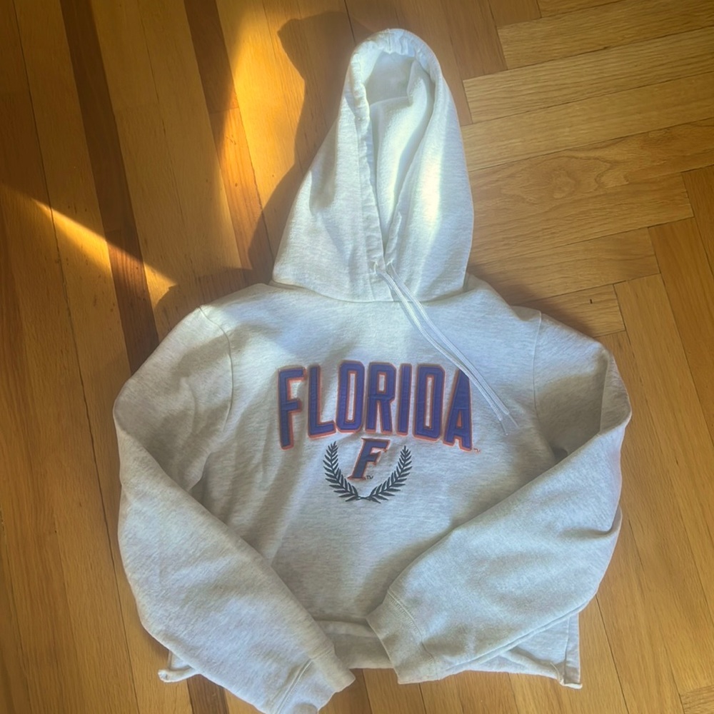 UF adult medium cropped hoodie. Not oversized, fits like a small to me.